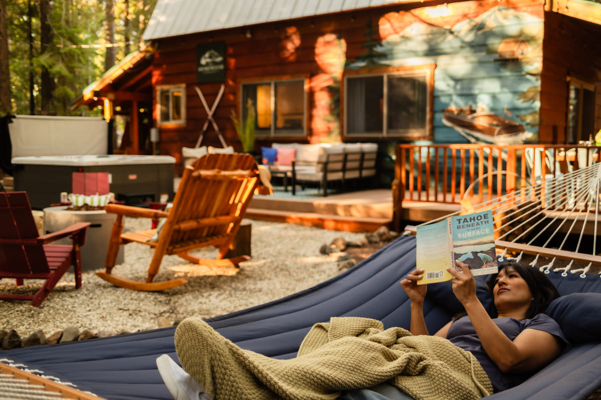 Reading in the hammock by the fire pit